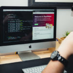 man staring at computer screen