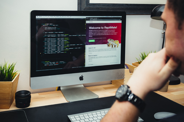 man staring at computer screen